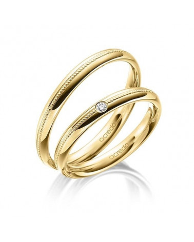 Finas alianzas de boda en oro amarillo con un diamante y acabado especial - Alianzas de boda - 




