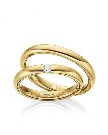 Finas alianzas de boda clásicas en oro amarillo con un diamante al aire - Alianzas de boda - 



