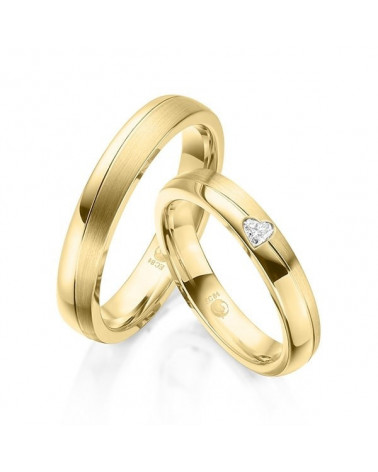 Alianzas de boda de oro con un diamante en forma de corazón - Alianzas de boda - 


