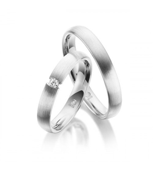 Alianzas de matrimonio mate en Platino con un diamante al aire - Alianzas de boda - 

