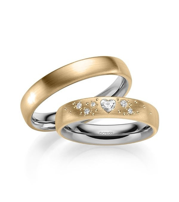 Originales anillos de boda en dos colores y diamante en forma de corazón. - Alianzas de boda - 


