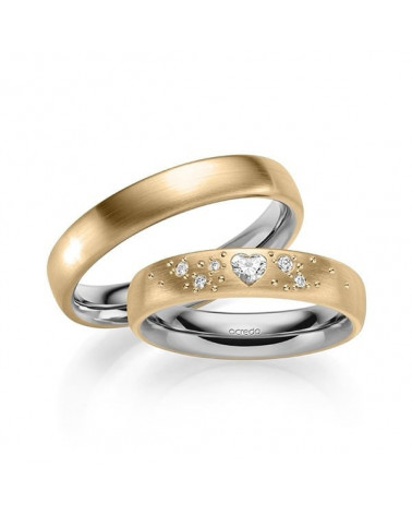 Originales anillos de boda en dos colores y diamante en forma de corazón. - Alianzas de boda - 


