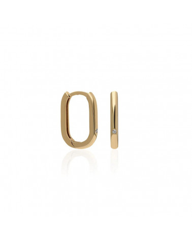 Aros ovalados de oro de 18 quilates con un diamante | Staring
