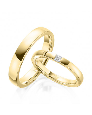 Alianzas de boda de oro con dos diamantes talla princesa